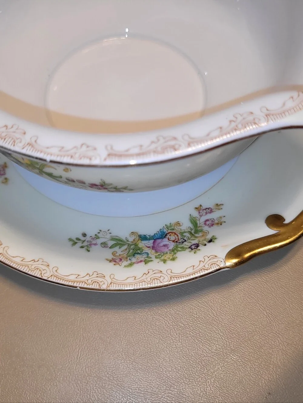 Mieto Porcelain Hand Painted Gravy Boat with Attached Saucer.